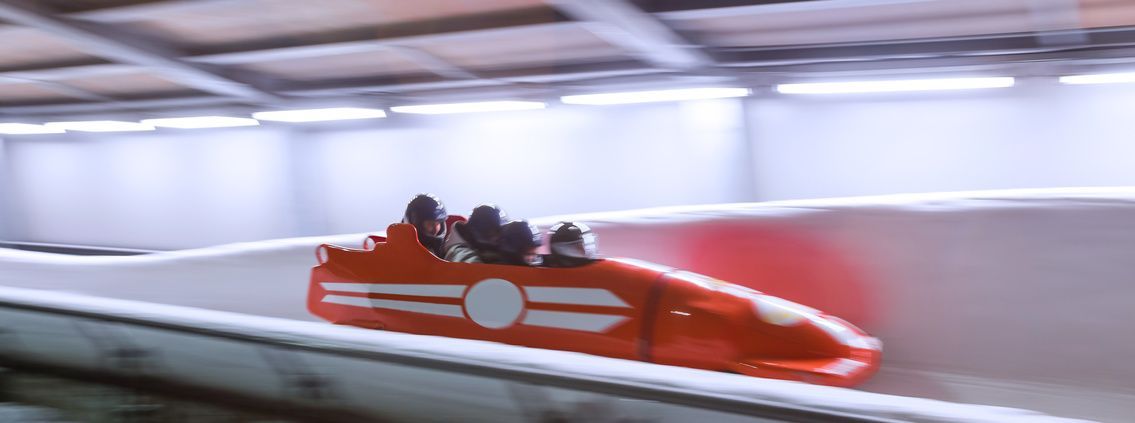 bob sled speeding in an ice channel